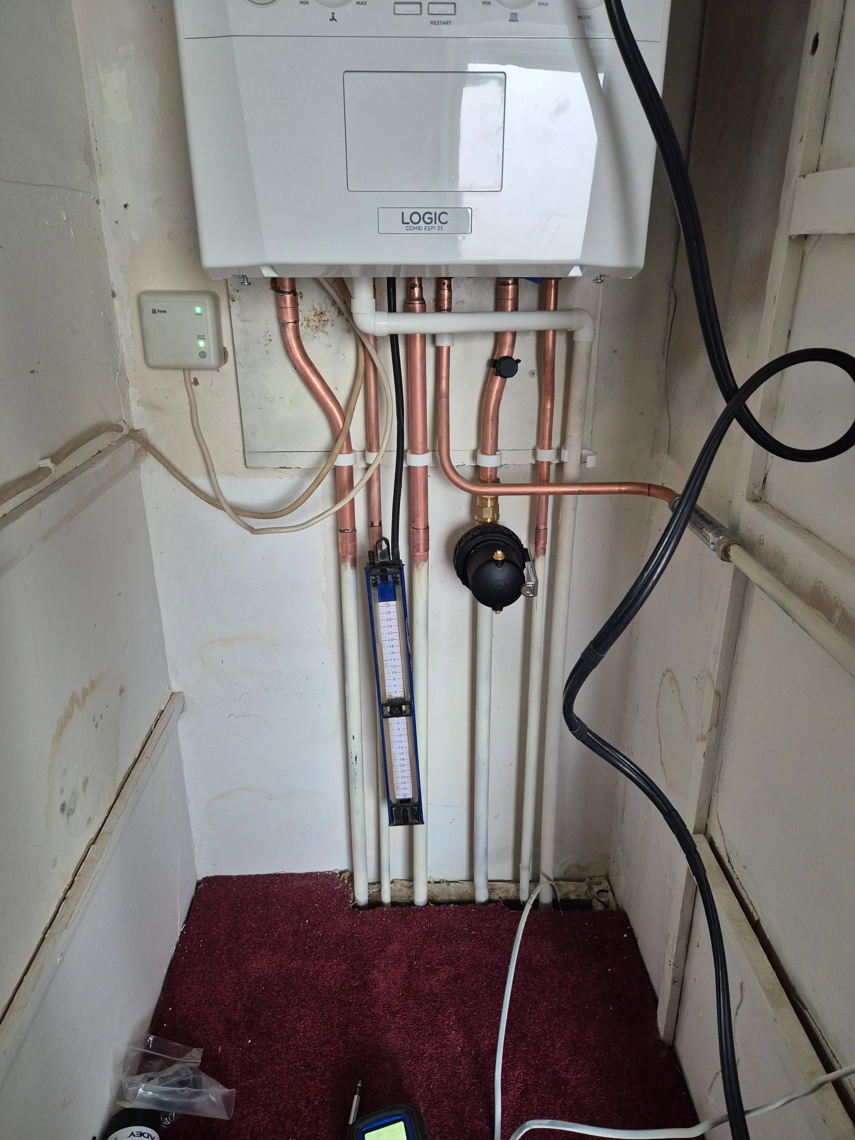 Ideal Logic combi boiler installed with full copper pipework and filter