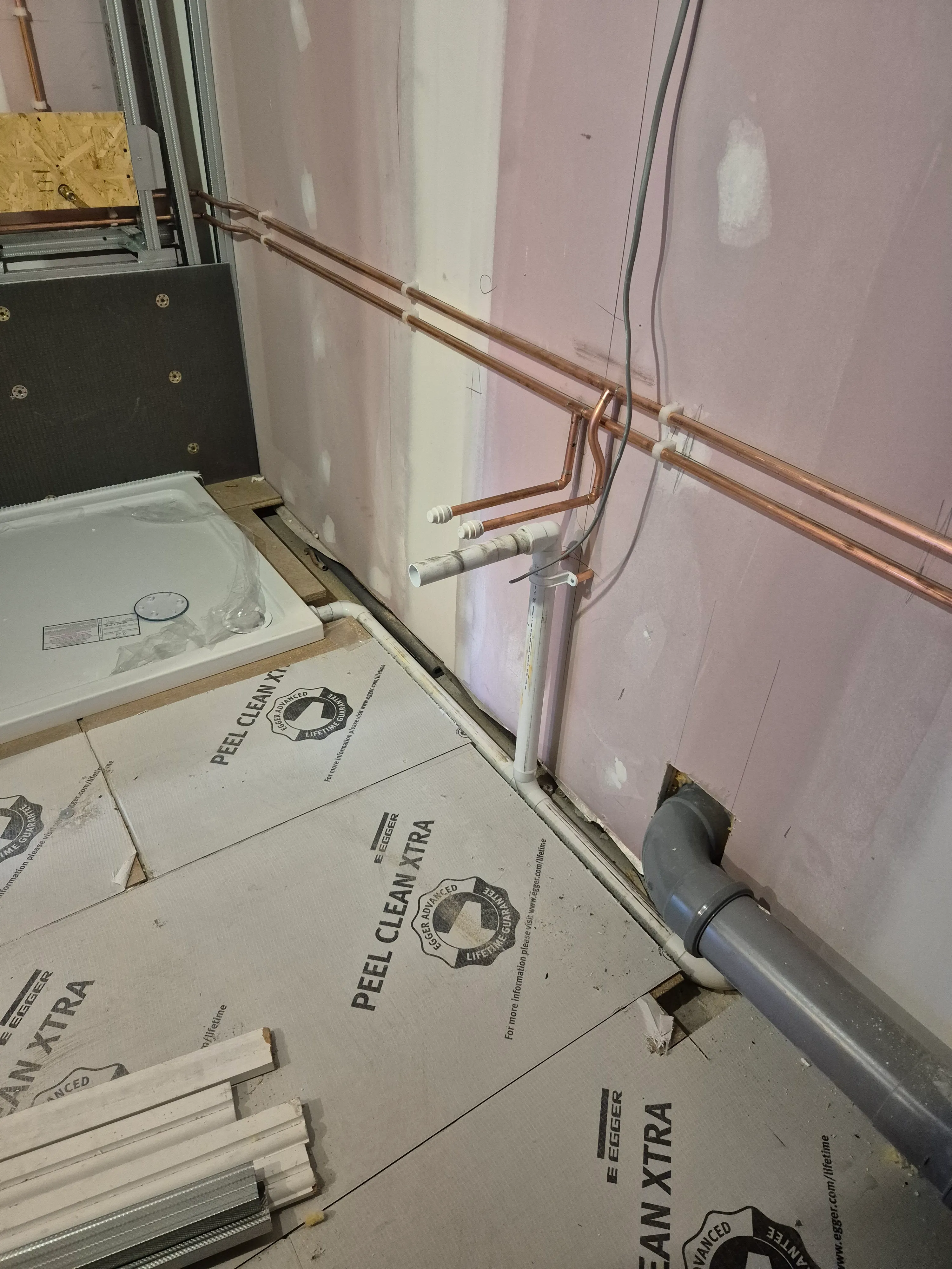 AC drainage and pipework before second fix