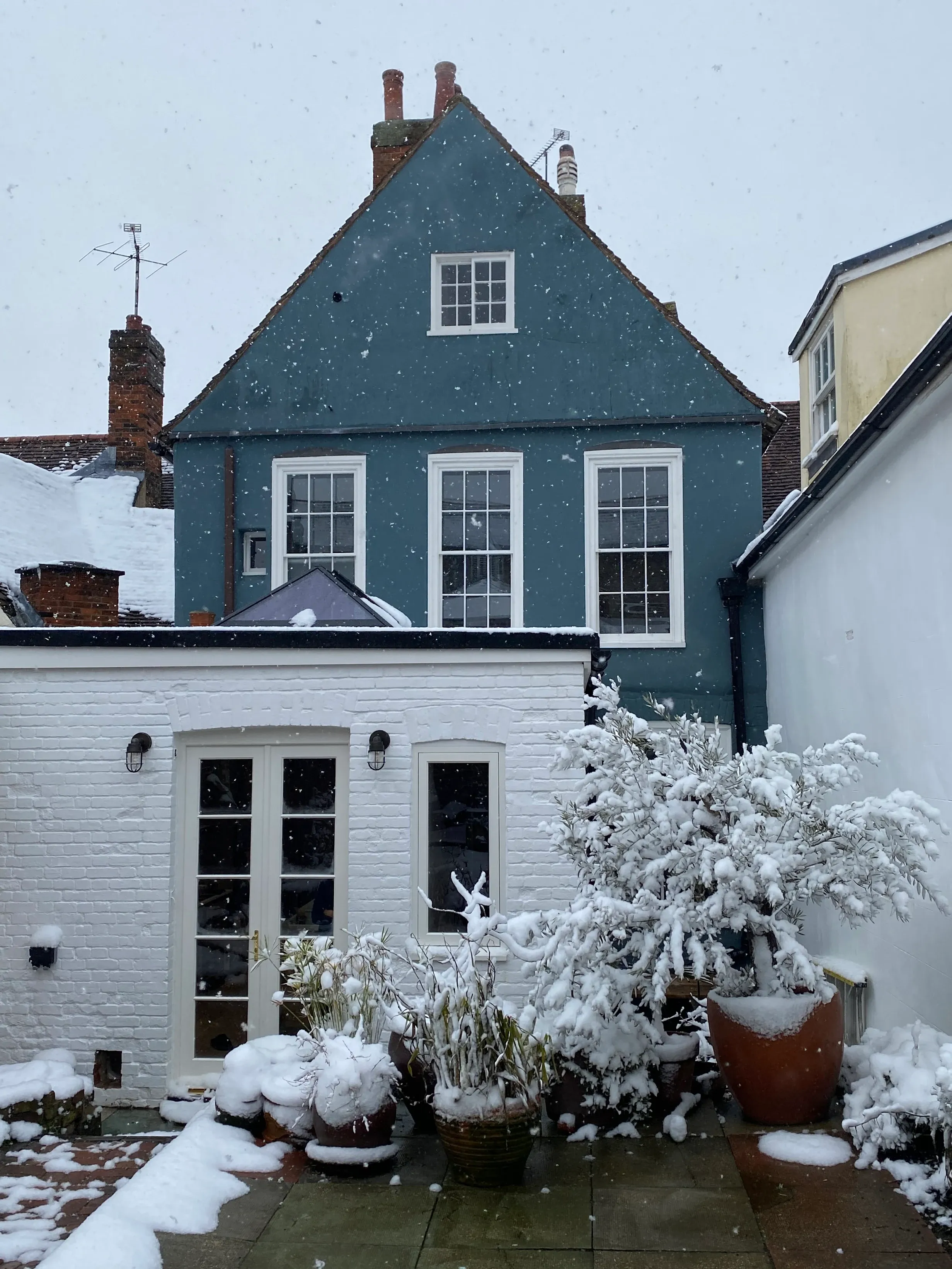 Rear of the same house in snow